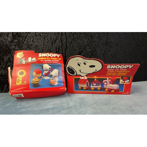 448 - Peanuts Snoopy Wind-Up Train and Animated Wind-Up toys in original boxes