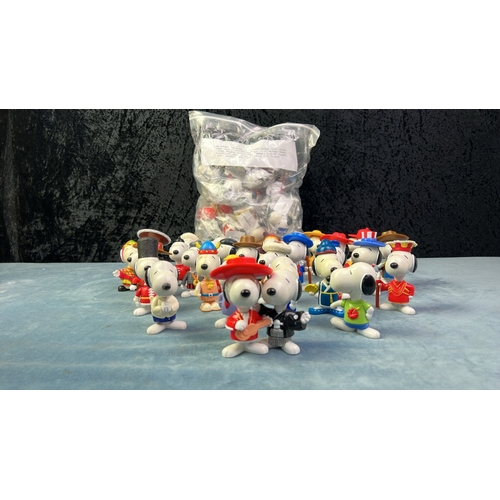 451 - Two sets of Peanuts McDonalds World Tour Snoopy toys