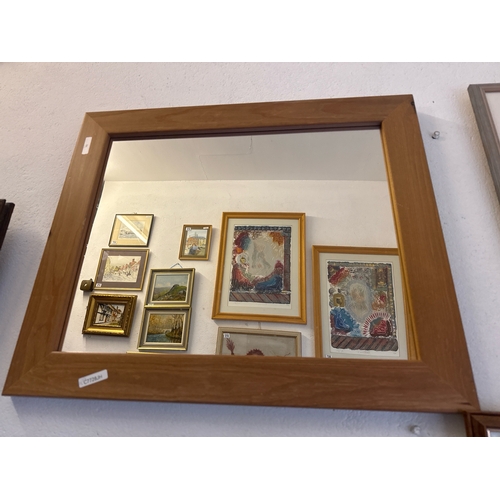 459 - Two pine framed wall mirrors, frames measure approx 72cm x 102cm and 52cm x 62cm