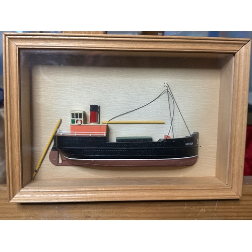 463 - Three framed wooden hand painted boat/ship cravings including a steam ship, a trawler and a lifeboat... 