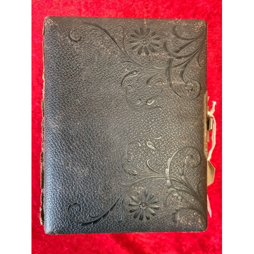 545 - Gorgeous leather bound volume of antiquarian photographic portraits, depicting  families and adults ... 