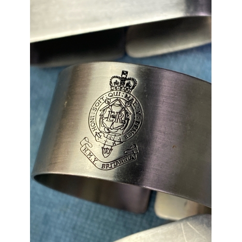 635 - Unusual set of 2 circular stainless steel HMY Britannia napkin rings with a further 7 numbered Viner... 