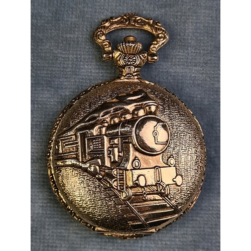 652 - Elgin gold tone pocket watch and Albert chain in working order along with a Citron steam train desig... 