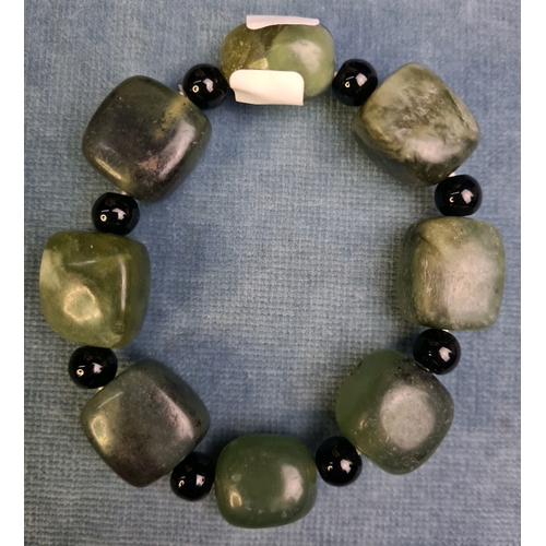 660 - Two polished agate stone bead necklaces and a bracelet