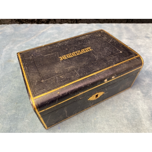 670 - A leather covered box, marked jewellery in gold lettering, has a tray containing vintage treasures i... 