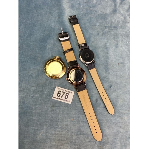 678 - A trio of of watches inc a black and gold coloured Kemangi, a black and gold coloured quartz watch a... 