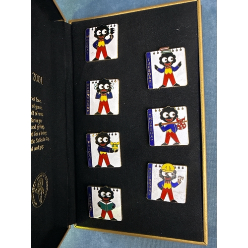 686 - Golly’s Diary 2001 boxed set of seven enamel pin badges in presentation box