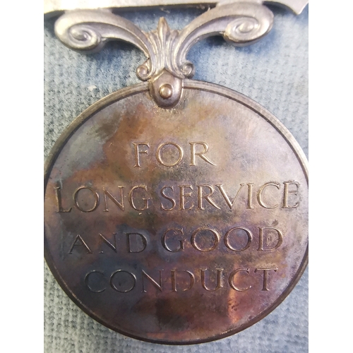 699 - Queen Victoria Long Service medal in the Volunteer Force + King George V Long Service and Good Condu... 