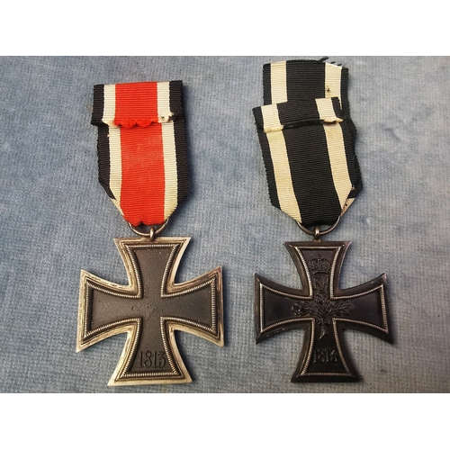 701 - Two German Iron Crosses: one dated 1813 and 1914; the other 1813 and 1939.