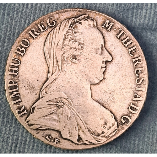 709 - Austrian Maria Theresa Thaler silver crown. 1780. Some wear but distinct lettering. 28 grams.