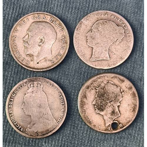 726 - 4 old silver shillings. Worn.