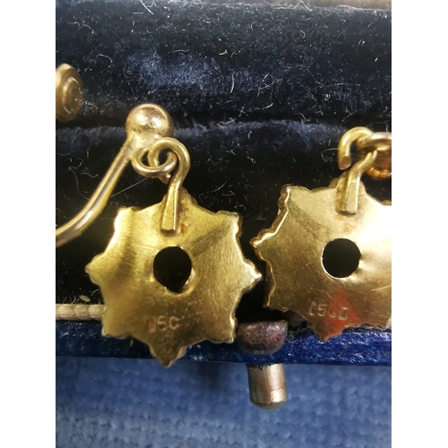 771 - Lovely pair of screw-in 15 carat gold earrings with a diamond in each one. Original W Brufords leath... 