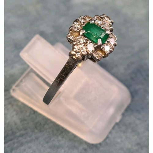 772 - Beautiful emerald and diamond platinum ring. Size Q