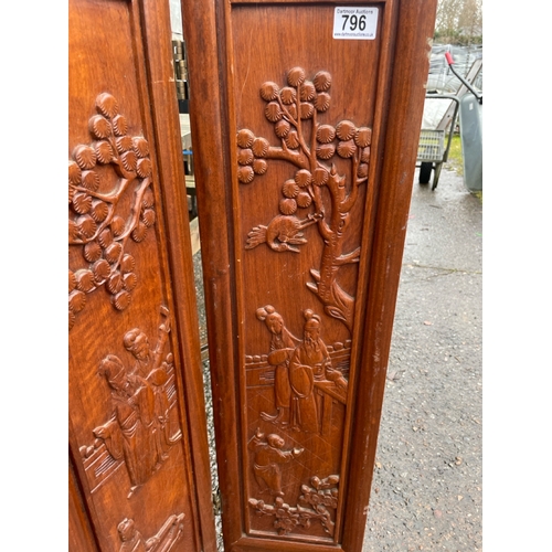 796 - Oriental hardwood 4 leaf folding screen with carved scenes to each leaf.  Appears to be just the bot... 