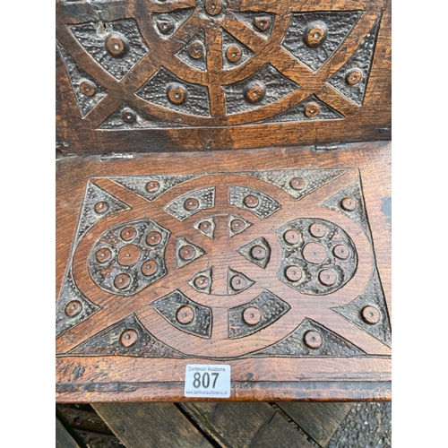 807 - Heavily carved arts & crafts medieval revival style oak small seat/box with hinged lid.  Ideal for u... 