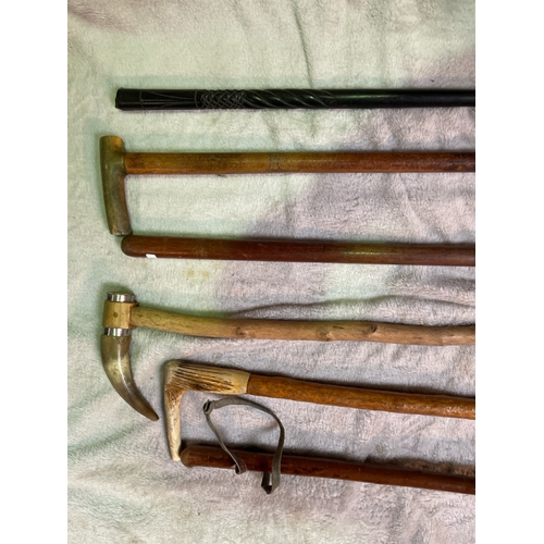 833 - 6 walking sticks/canes of various design.