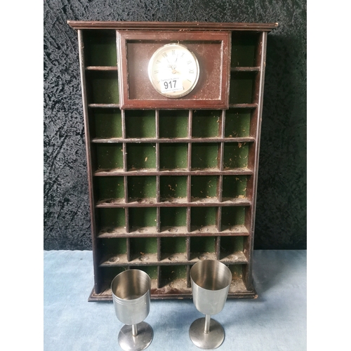 917 - Wall collectibles display unit with integral clock and two stainless steel goblets