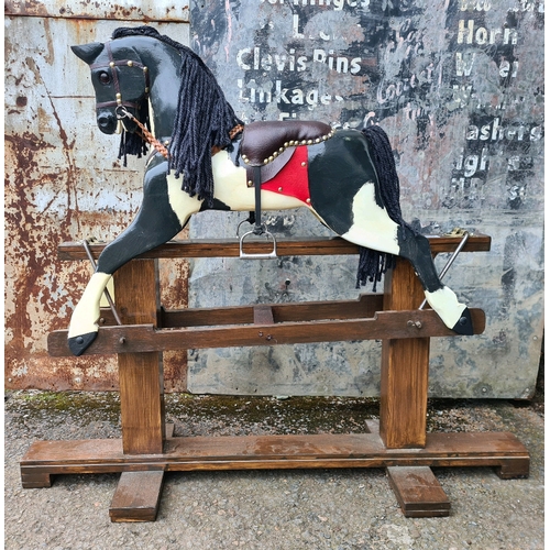 109 - A stablemate of the previous lot - another fabulous swinging rocking horse with woolly mane and tail... 