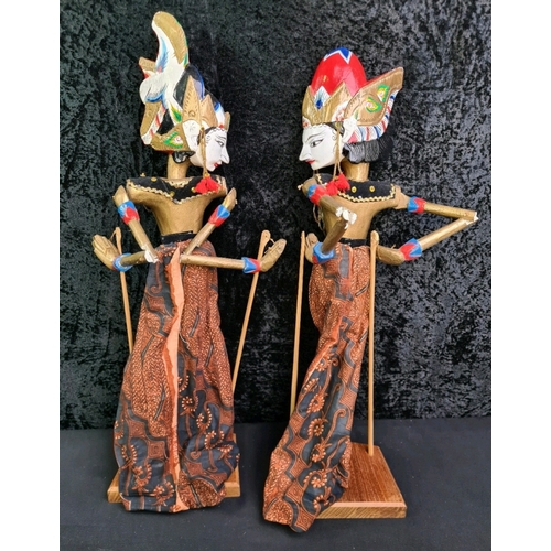 126 - Two Wayang Golek stick puppets