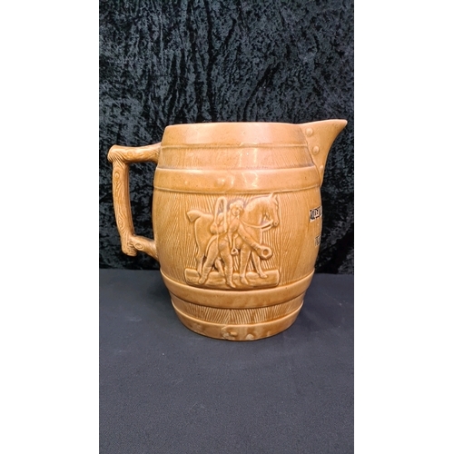 17 - Large stoneware barrel design pitcher with an inscription dated 1907, 31.5cm tall