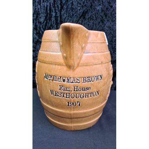 17 - Large stoneware barrel design pitcher with an inscription dated 1907, 31.5cm tall