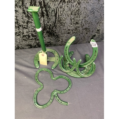 238 - Collection of interesting horseshoe based trivets and stands