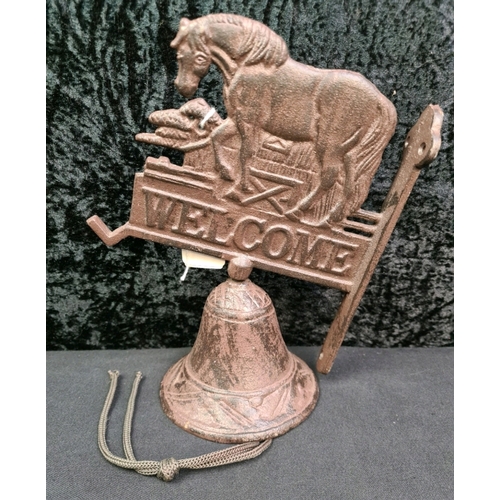 24 - Wall mounted cast iron bell with horse design