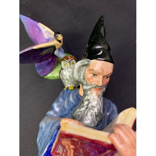 241 - Fabulous 'The Wizard' figurine from Royal Doulton together with a pretty Carlton Ware fairy