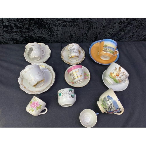 253 - A real mix of china cups and saucers inc from