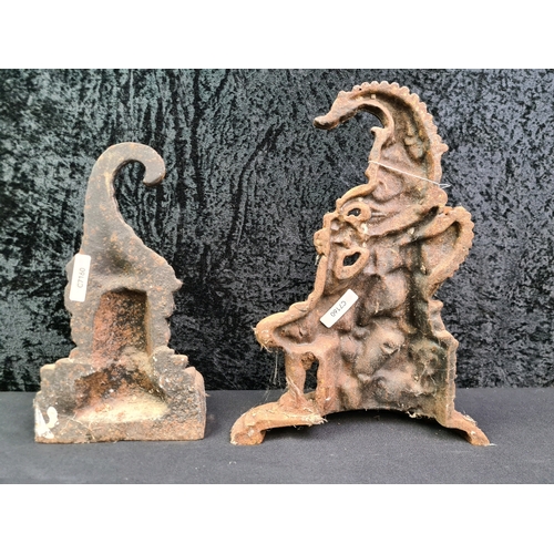 28 - Vintage cast iron Mr Punch design doorstops