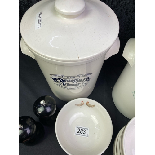 283 - Kitchenware items Inc chicken embellished bowls, two large ceramic McDougall's Flour pots and black ... 