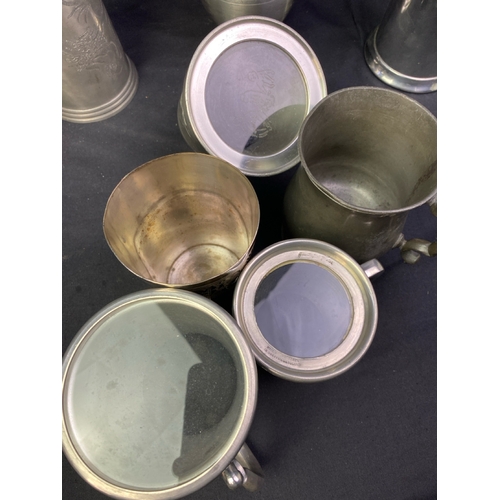 302 - Collection of pewter tankards from various eras, plus beaker and jug