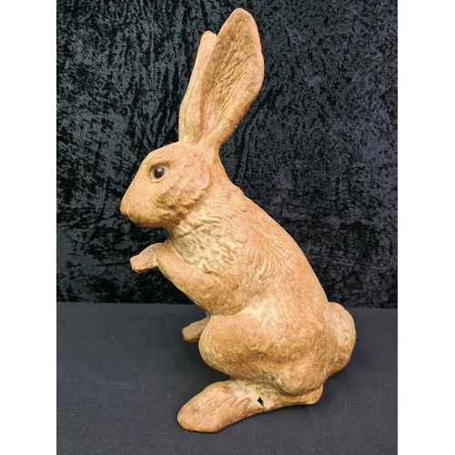 31 - Bennetts Pottery hare, 33cm tall (repairs to one foot and both ears)