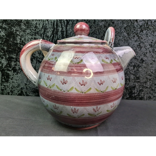 33 - Fabulous giant pottery teapot, hand painted with purple flower design and over-glazed. Stamped ‘TOYA... 