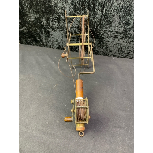 330 - Quirky vintage fly fishing line winder and dryer with 3 interesting and collectable fishing gaffs