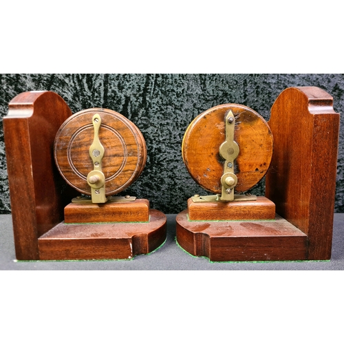 38 - Pair of wooden bookends with vintage centre pin fly fishing reels