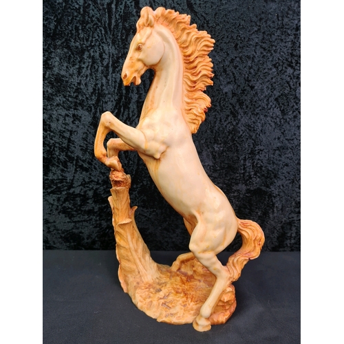 4 - Resin figurine of a rearing stallion horse, approx 38cm tall