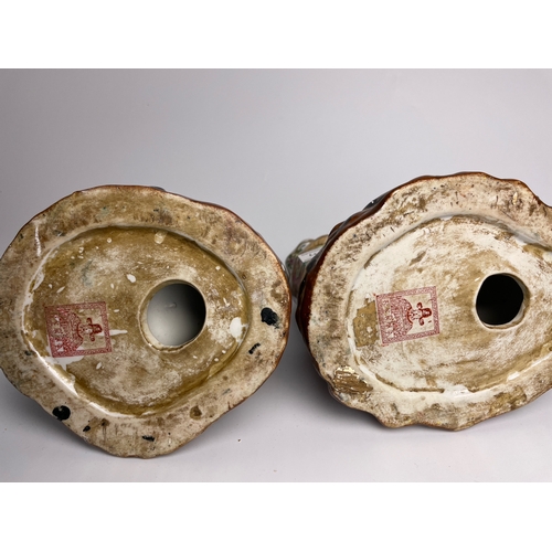 402 - A pair of highly unusual Chinese monkey vases of some age, with regional mark to base