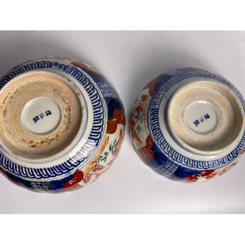 418 - Three Japanese Imari bowls with hand painted detail, two have Fakae marks to base