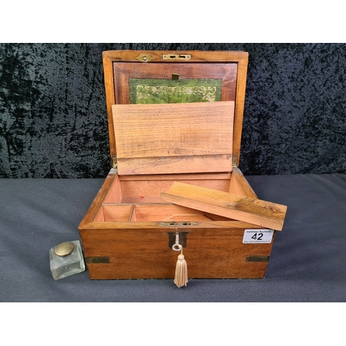 42 - Lockable writing slope with brass fitting and key and original ink well (one hinge a/f)