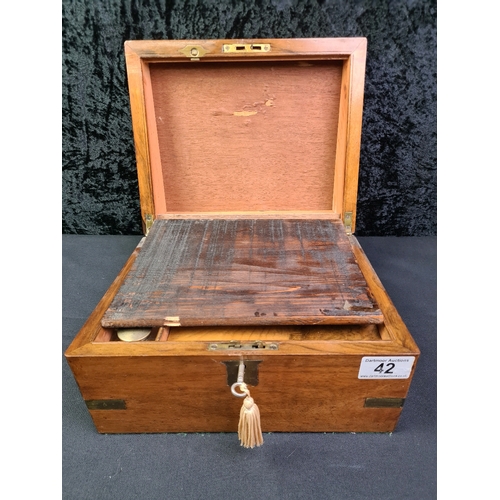 42 - Lockable writing slope with brass fitting and key and original ink well (one hinge a/f)