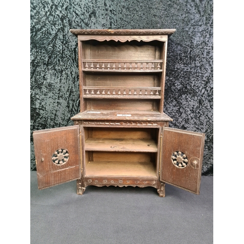 48 - Antique French miniature carved wood Breton dresser with cupboards and plate racks, measures 44.5cm ... 