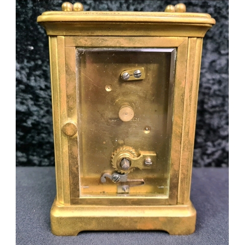 49 - Emanuel, Southampton French made brass carriage clock with key in glass fronted carry case