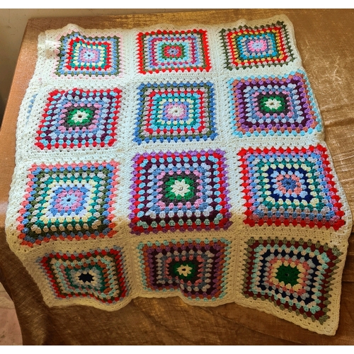 521 - Lovely crocheted blanket. Measuring approx 144cm by 106cm.