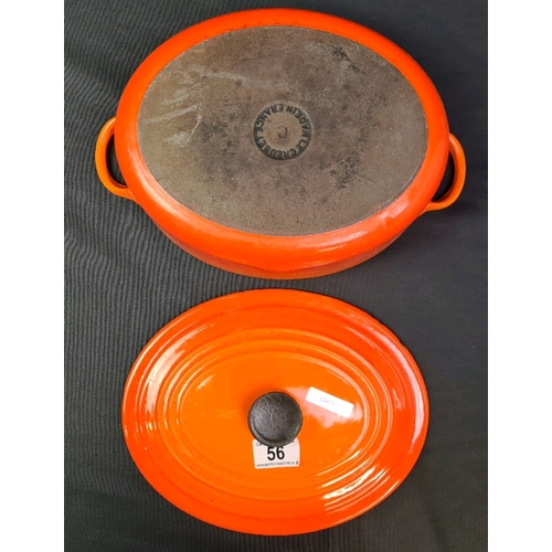 56 - Le Creuset Flame orange lidded casserole dish (some chips to base inside)