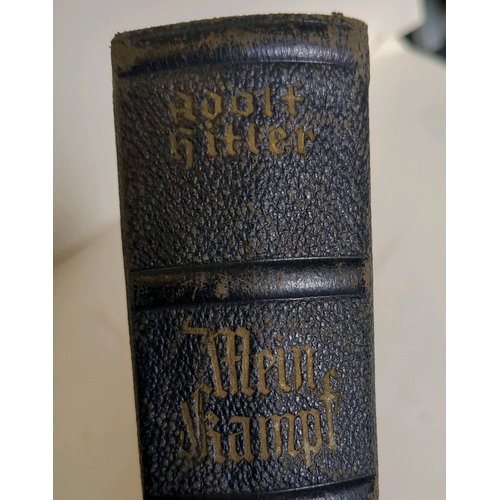 616 - A copy of Adolf Hitler's Mein Kampf, 1940 h/b, D
Wedding dedication and dated 1940 by hand Militaria