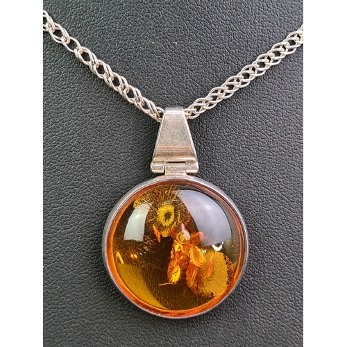 678 - Amber 925 marked silver pendant with green stone silver pendant