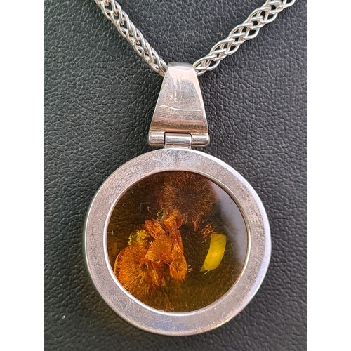 678 - Amber 925 marked silver pendant with green stone silver pendant