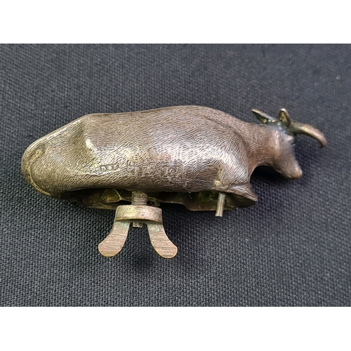 688 - Duty marked antique silver mascot of a bovine at rest