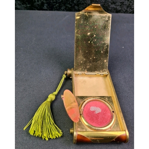 689b - Vintage Deco powder compact from 1930s in form of a camera, with green tassel and tortoise shell eff... 